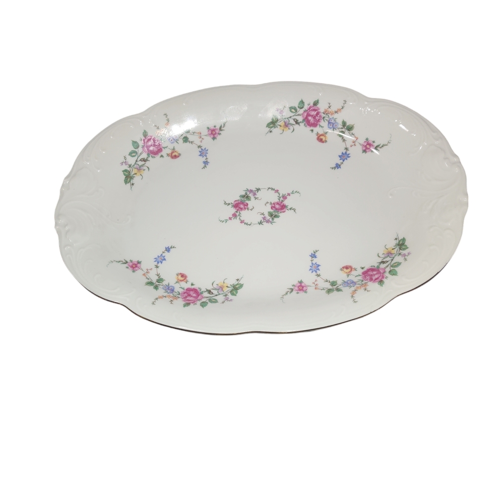 Charming White Oval Serveware with Scalloped Edge and Floral Pattern